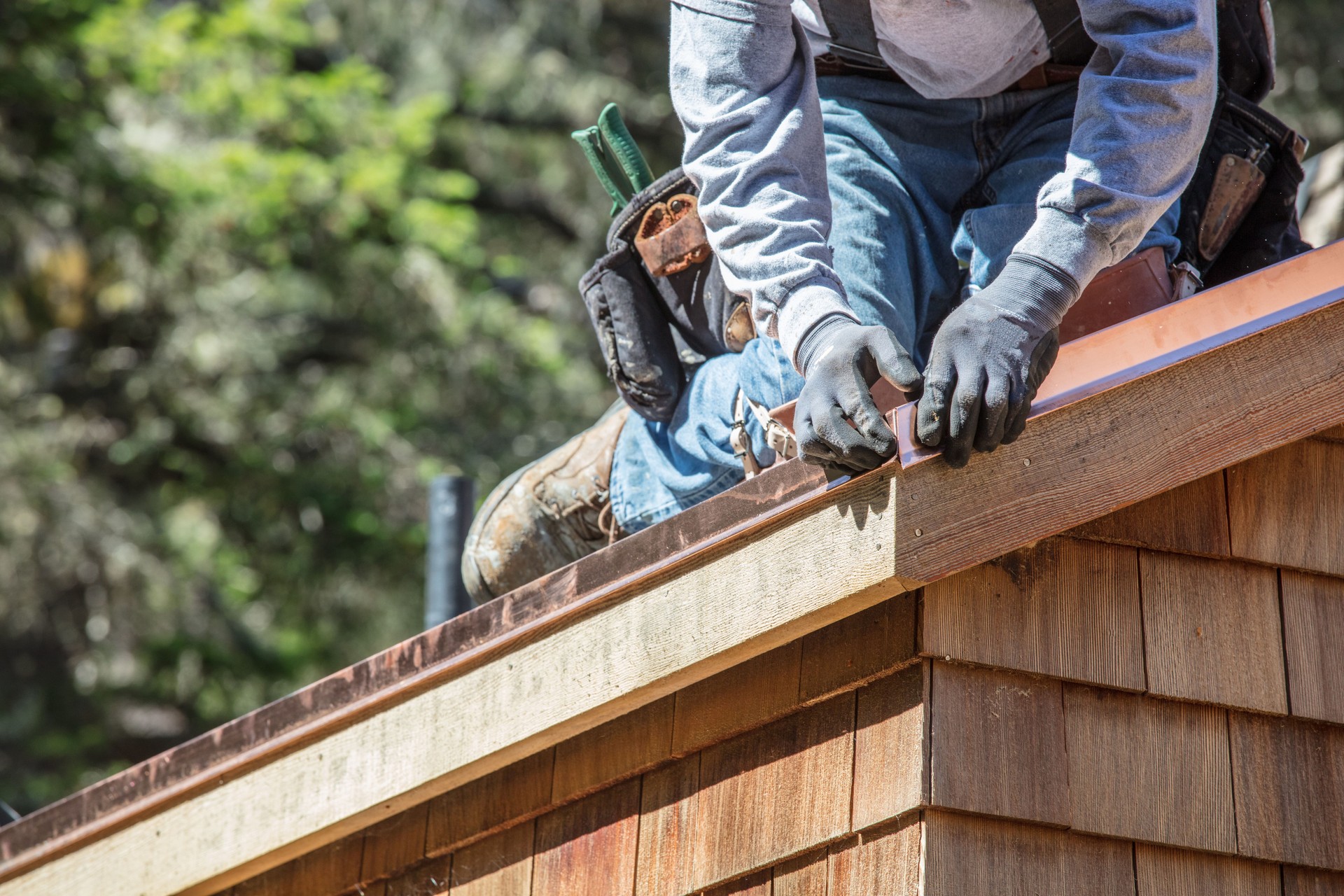 Installing new roof with copper flashing